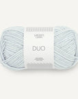 A skein of arctic ice blue Sandnes Garn Duo yarn with a label in the center displaying the brand and product name.