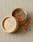 Cocoknits opening colored stitch markers in a cardboard container