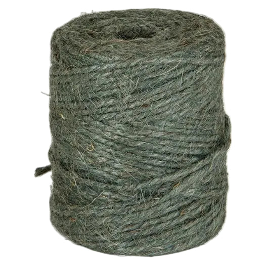 Roll of green twine on a white background