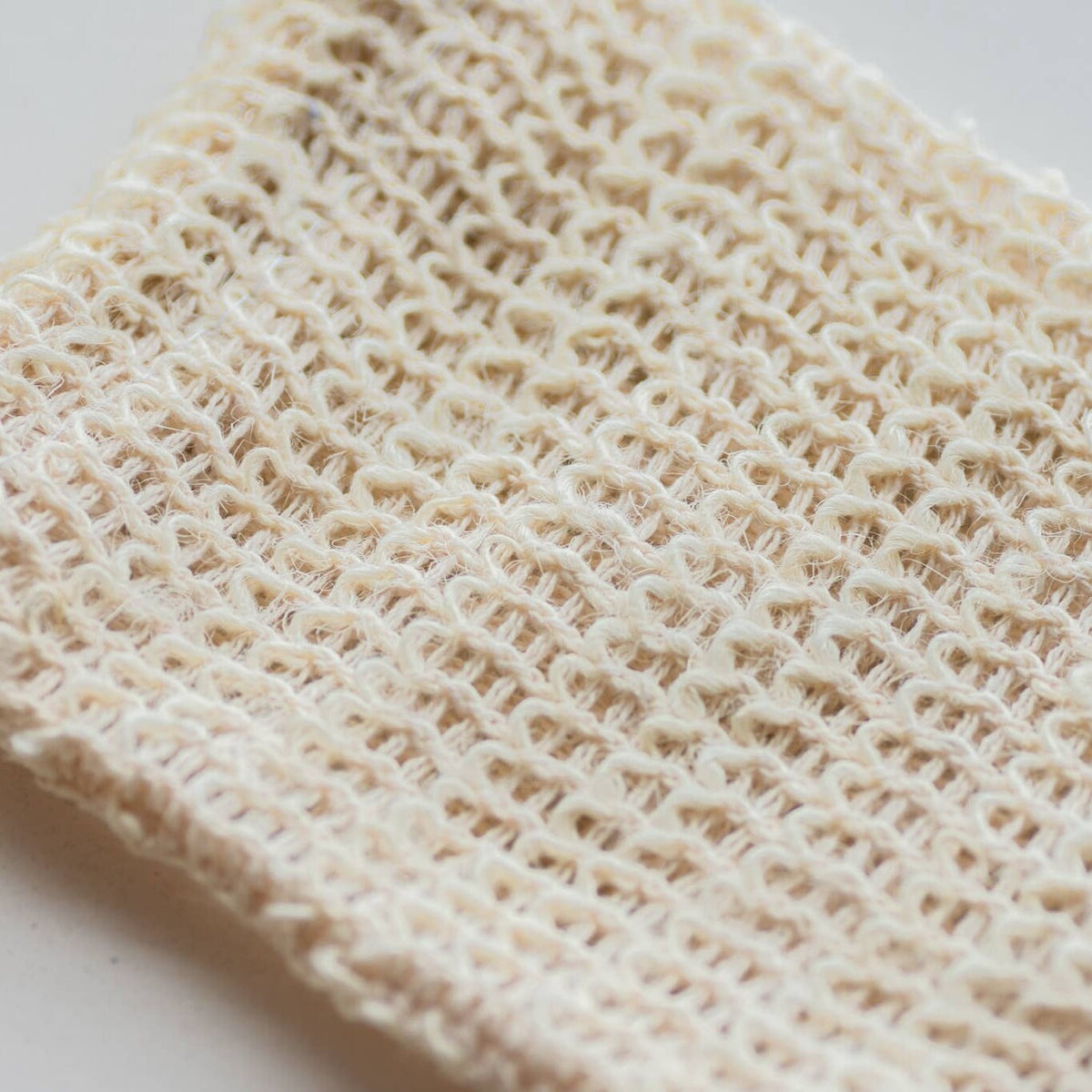 Close-up of the open weave of an agave fiber exfoliating soap bag